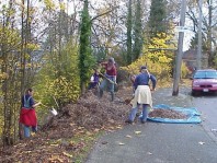 Loading wood chips to spread throughout the site.