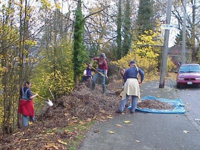 Loading wood chips to spread throughout the site.