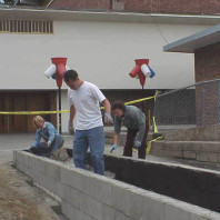 Moving construction rubble from the educational bed.