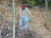 Preparing and installing stakes to keep the terracing materials in place.