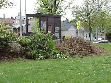 Mounds of removed plant debris waiting to be composted.