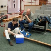 Dr. Henri and Joe Hudak learn how to use the field test kits.