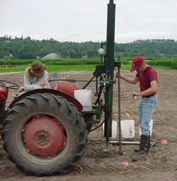 Photo of tractor mounted Giddings probe for deep core sampling of soil.