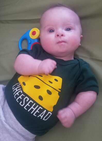 Baby wearing Cheesehead shirt