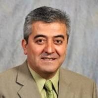 Headshot of Dogan Gursoy.