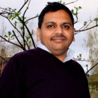 Headshot of Praveen Sekhar.