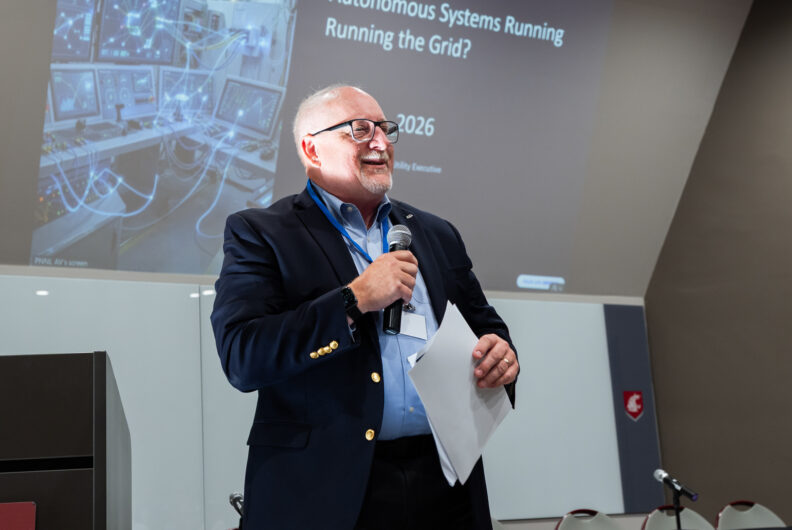 Man speaking into a microphone