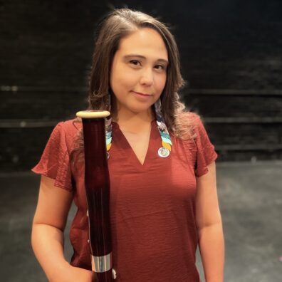Headshot of Jacqueline Wilson with a bassoon.