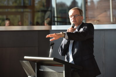 A photo of a faculty member giving a presentation