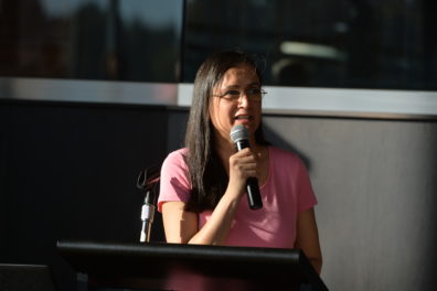 A photo of a faculty member giving a presentation