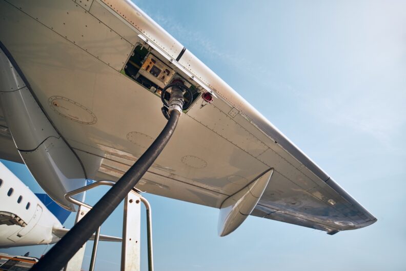 Refueling a jet airplane.