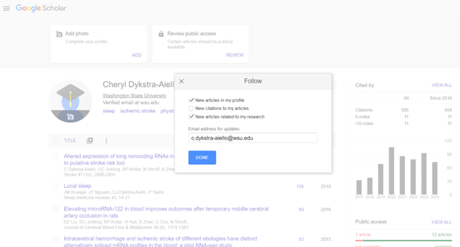 Google Scholar profile page with follow options modal window active.