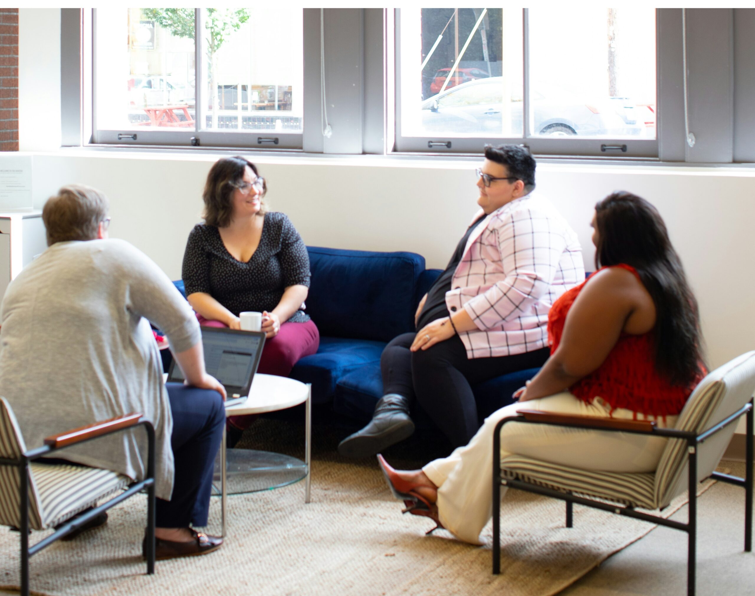 Notebook and pencils on a wood table.