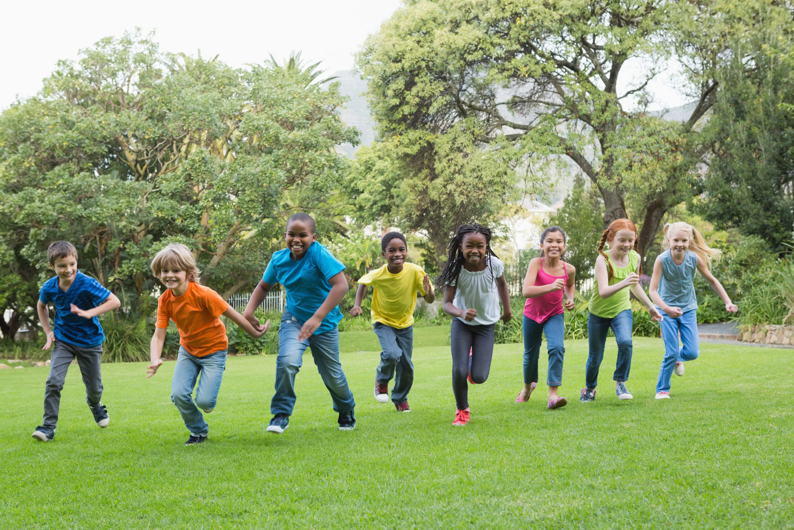 Children running in park.
