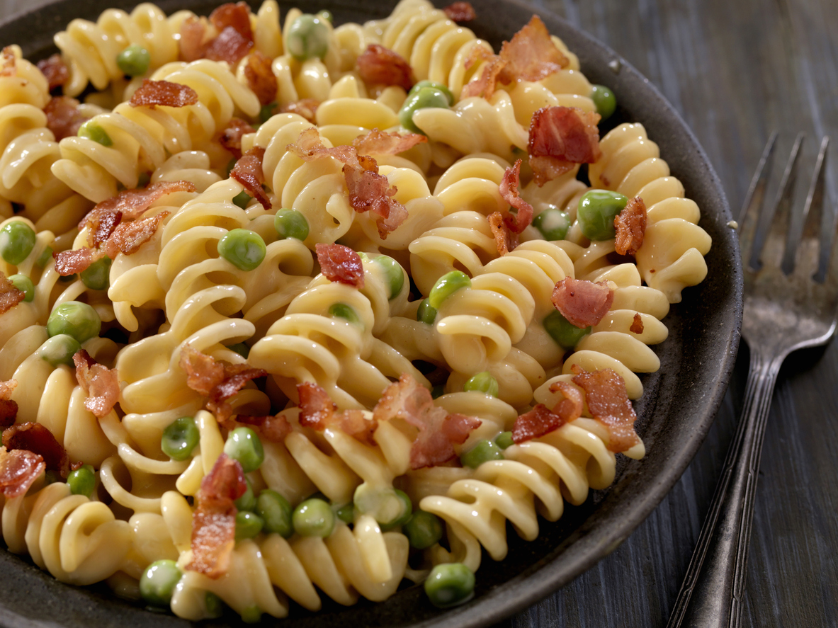 Creamy Rotini and Cheese Carbonara with Peas.