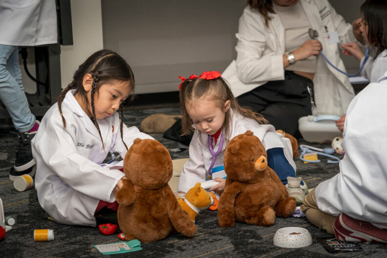 Little birds participants building teddy bears