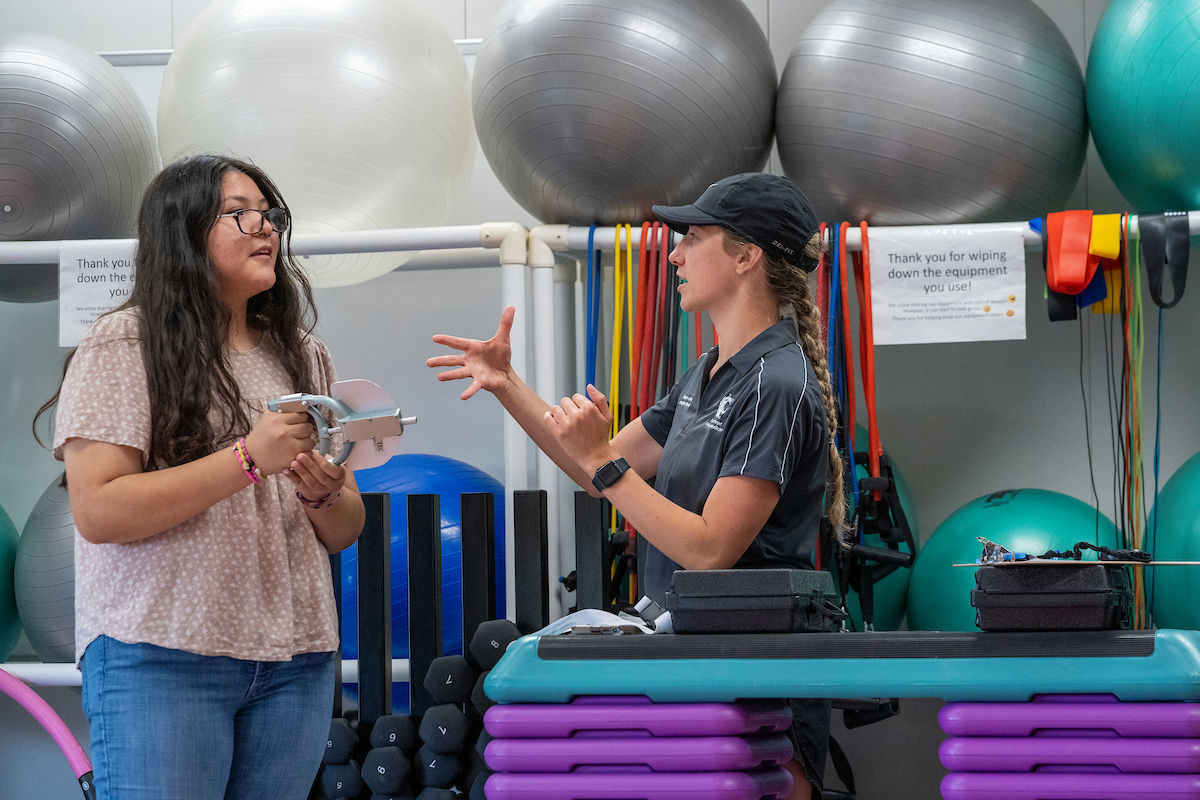 NEP program students in athletic room