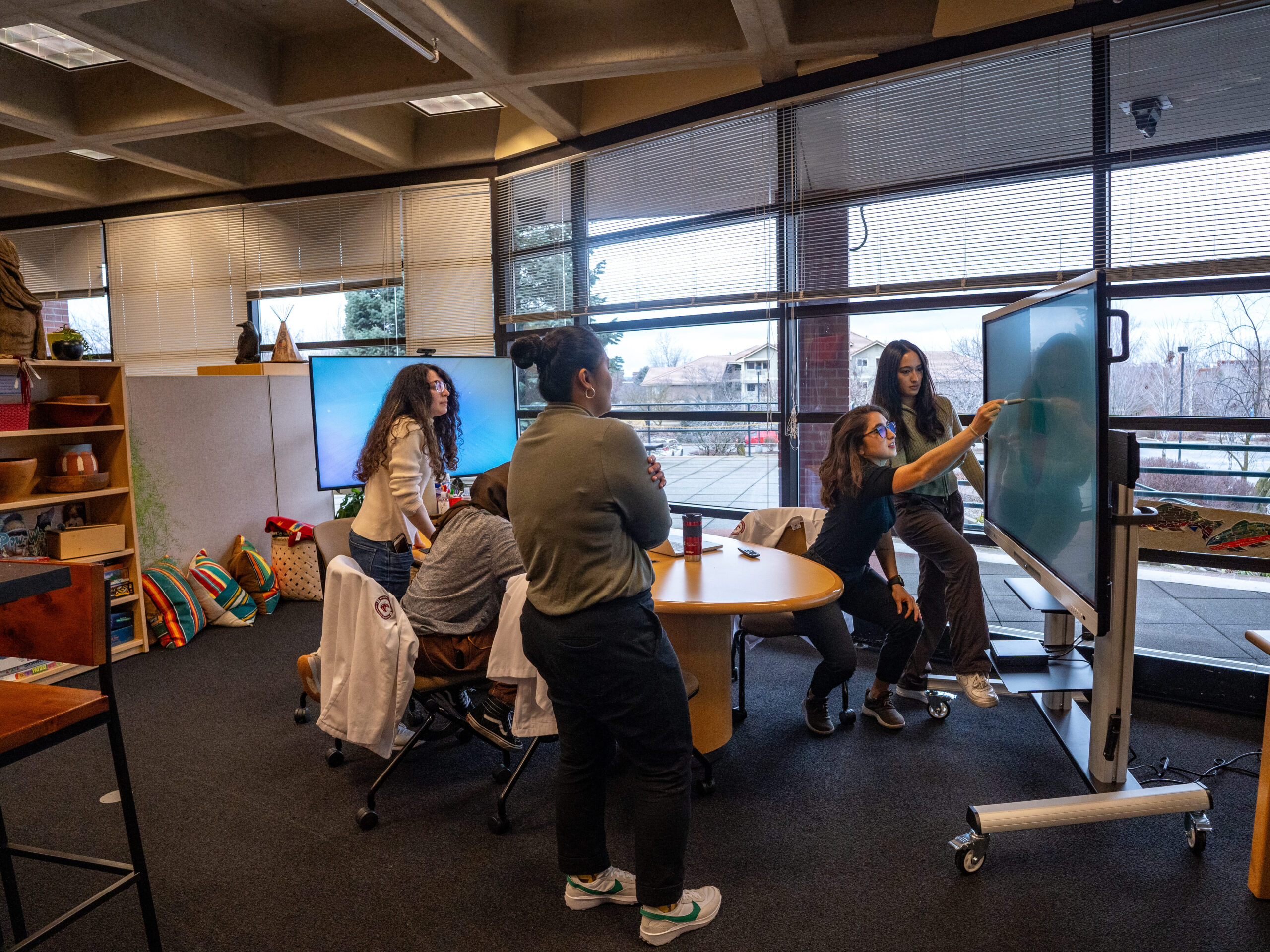 Students working in the center for native american health