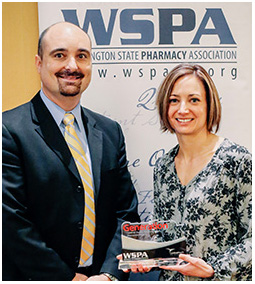 Shannon panther accepts award