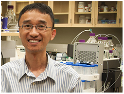 dr. gregory poon in the lab