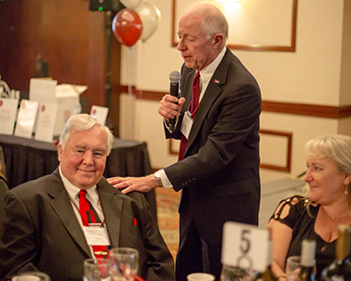 Audience members telling stories about R. Keith Campbell