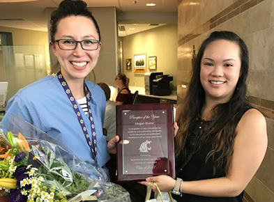 Megan Braine receiving Preceptor of the Year award 