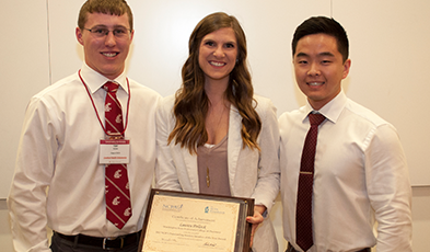Lauren Pollock with award