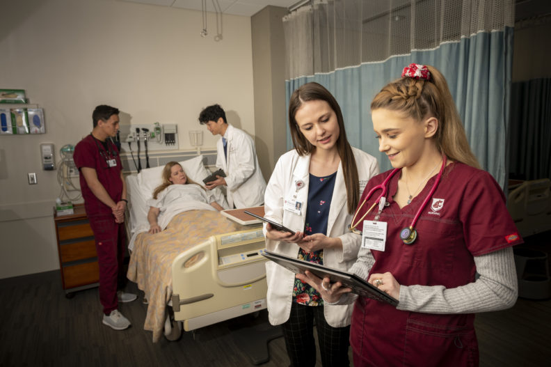 Washington State University pharmacy and nursing students learn to collaborate in patient care while utilizing the latest technology.