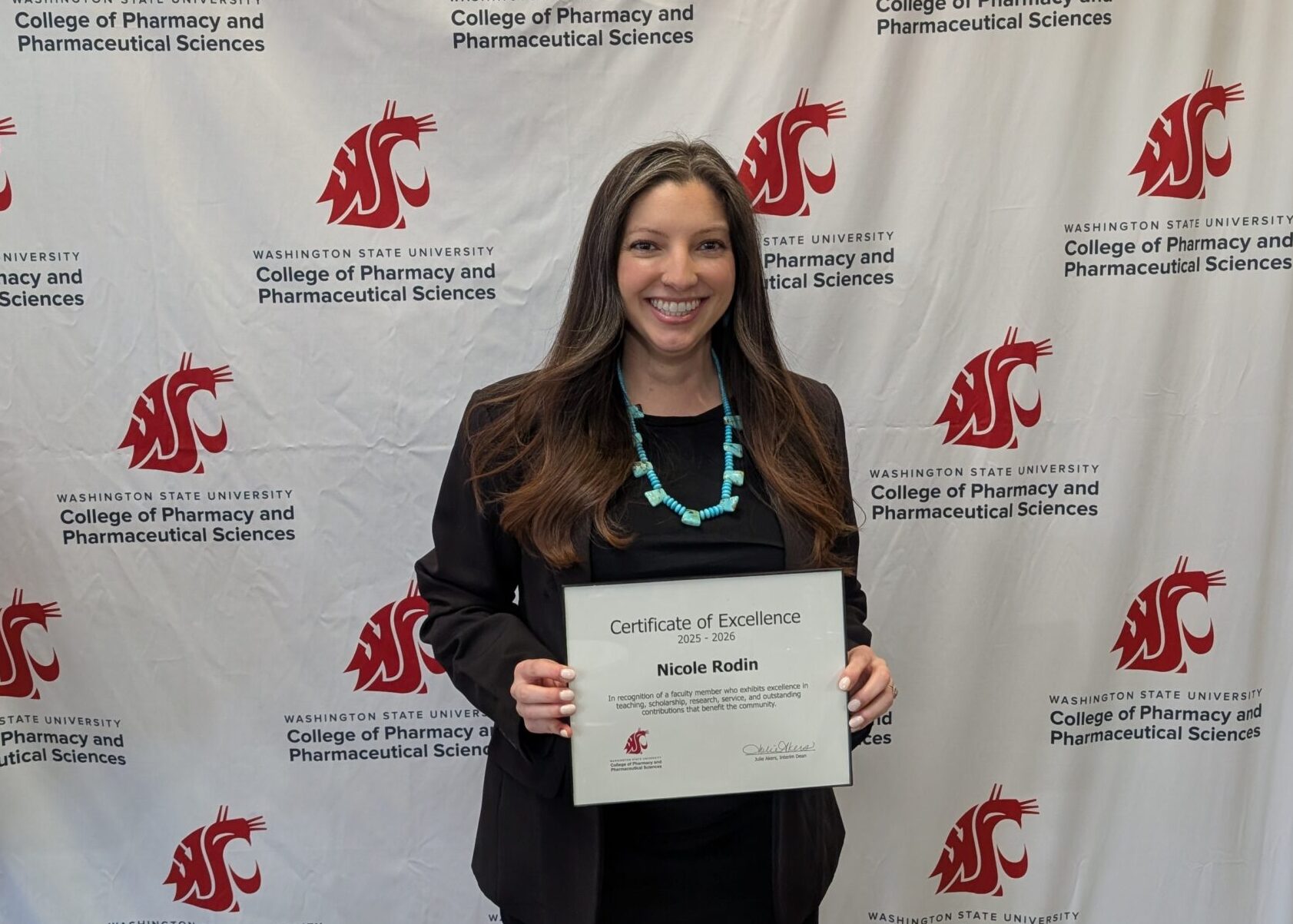 Nicole Rodin with Faculty Excellence Award