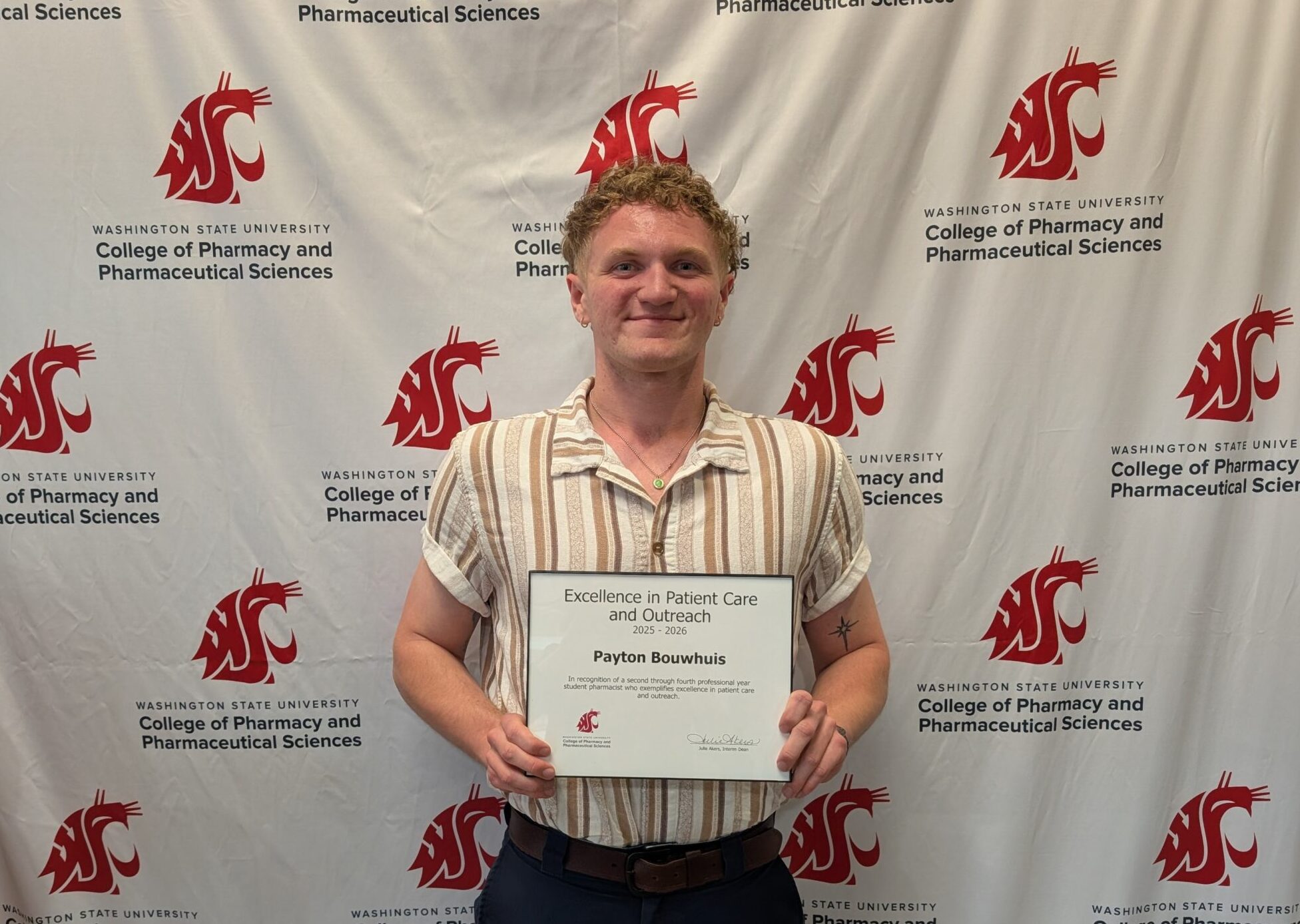 Payton Bouwhuis with Excellence in Patient Care and Outreach Award