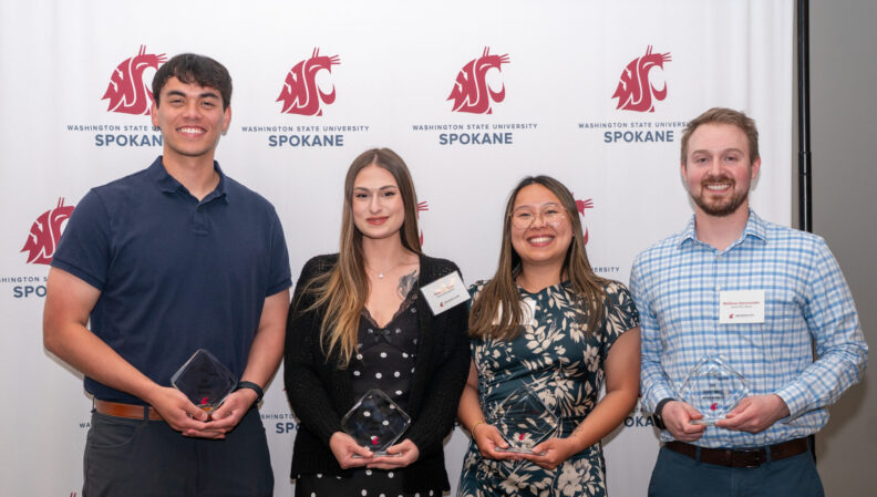 Drexler Yesiki, Seaonna Piper, Gillian Freeby, and Matthew Hohenwalter pose with their Health Sciences Excellence Awards