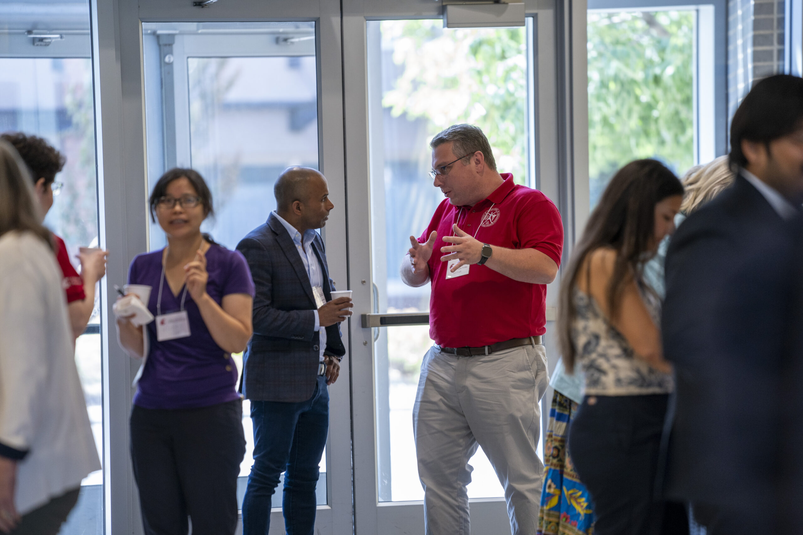 Guests interacting with each other at the Industry Advisory Board annual meeting.