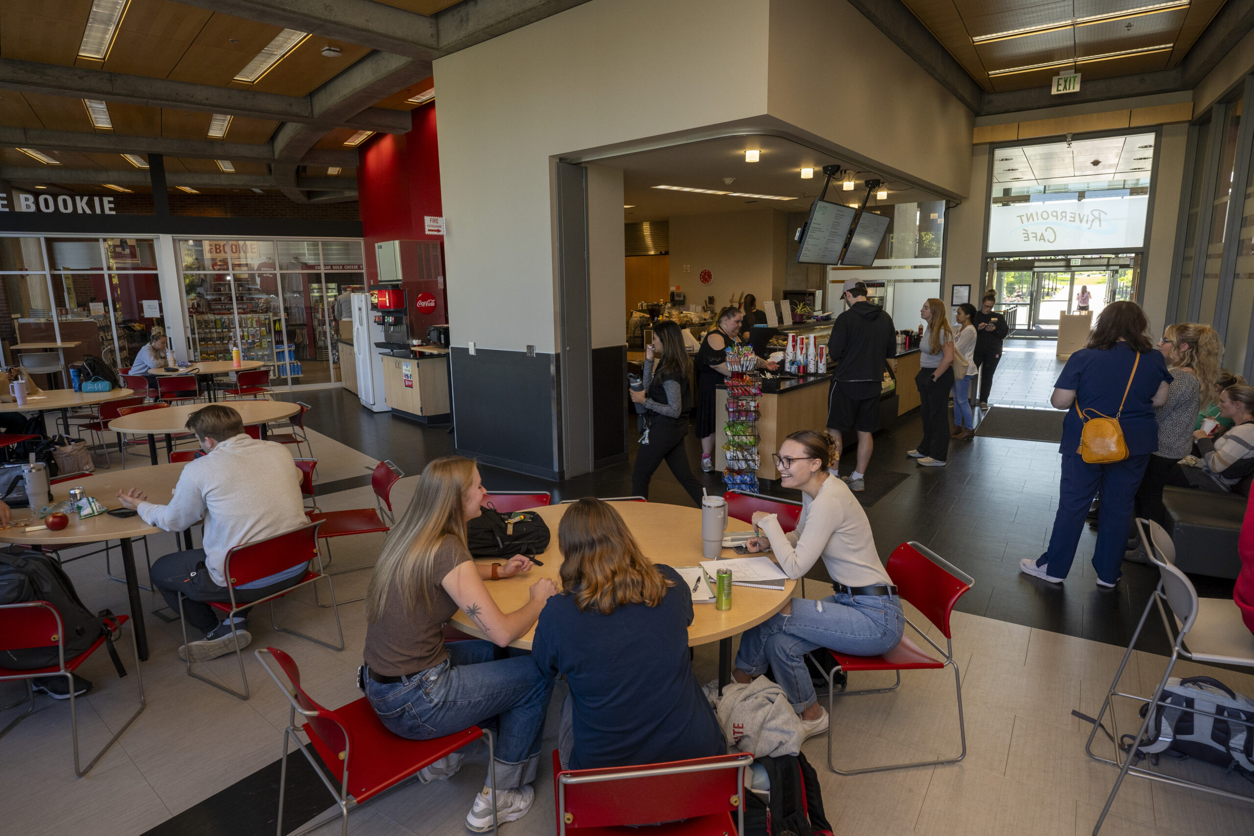 students gathering and interacting in the Riverpoint Cafe on WSU Spokane's campus