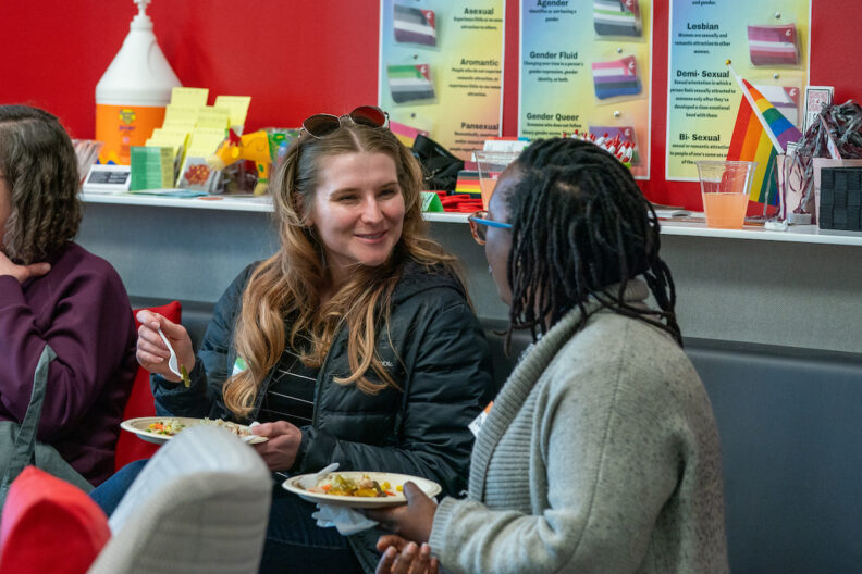 Students talking to each other during GEISO Spring celebration