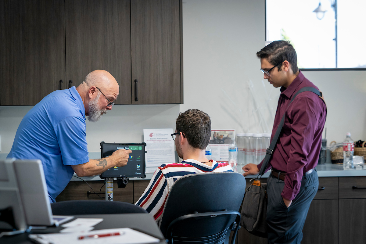 Student taking tour of Adaptive technology center