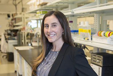 Lucia Peixoto in her lab on the WSU Health Sciences Spokane campus