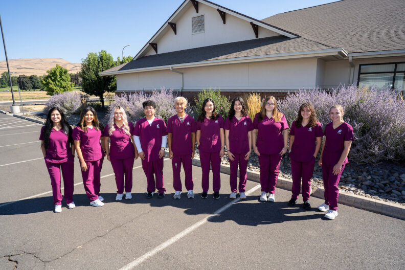 Group of nursing students in wine colored scrubs in Yakima.