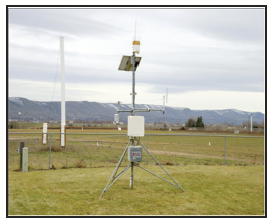 a weather station outside in a field