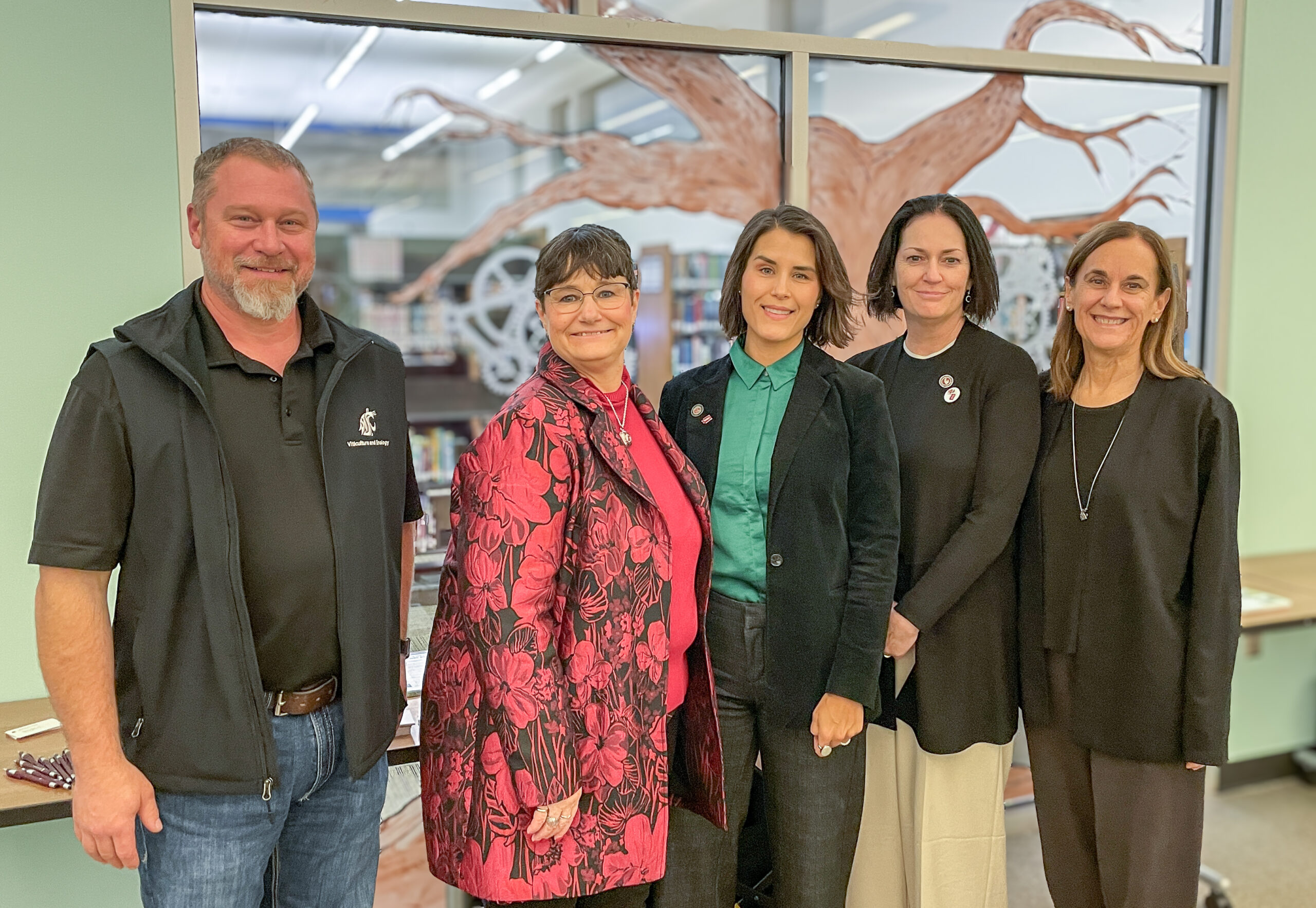 L-R Chad Kruger, INEF Assistant Director for Agriculture, Extension & Outreach, Noel Schulz, INEF Inaugural Director and Bob Ferguson Endowed Professor, Michelle Hrycauk Nassif, Cougar Tracks Director, Kate McAteer, WSU Tri-Cities Vice Chancellor for Academic and Student Affairs, Sandra Haynes, WSU Tri-Cities Chancellor at the Richland Public Library.