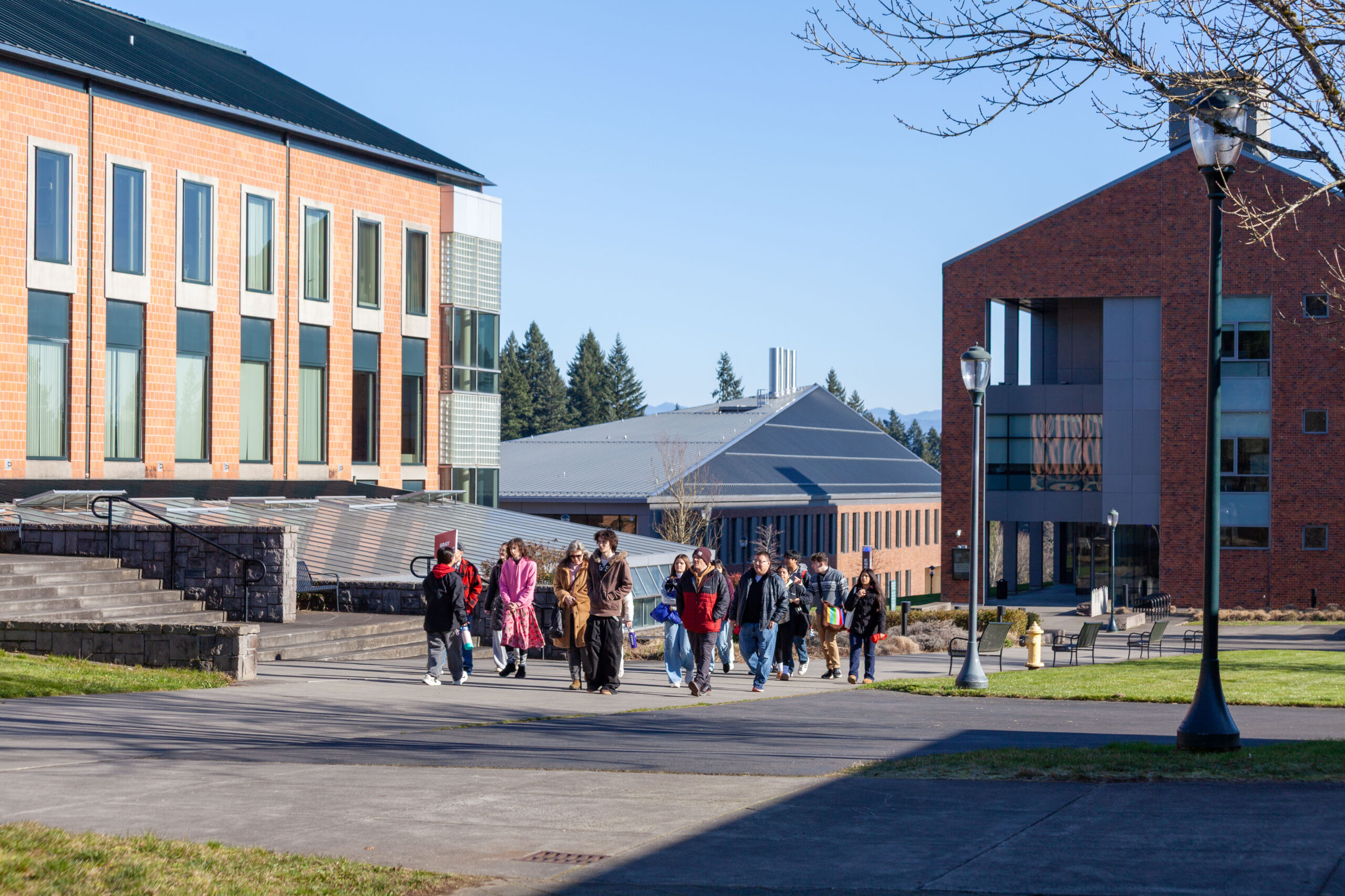 A group of prospective students taking a guided walking tour of the WSU Vancouver campus