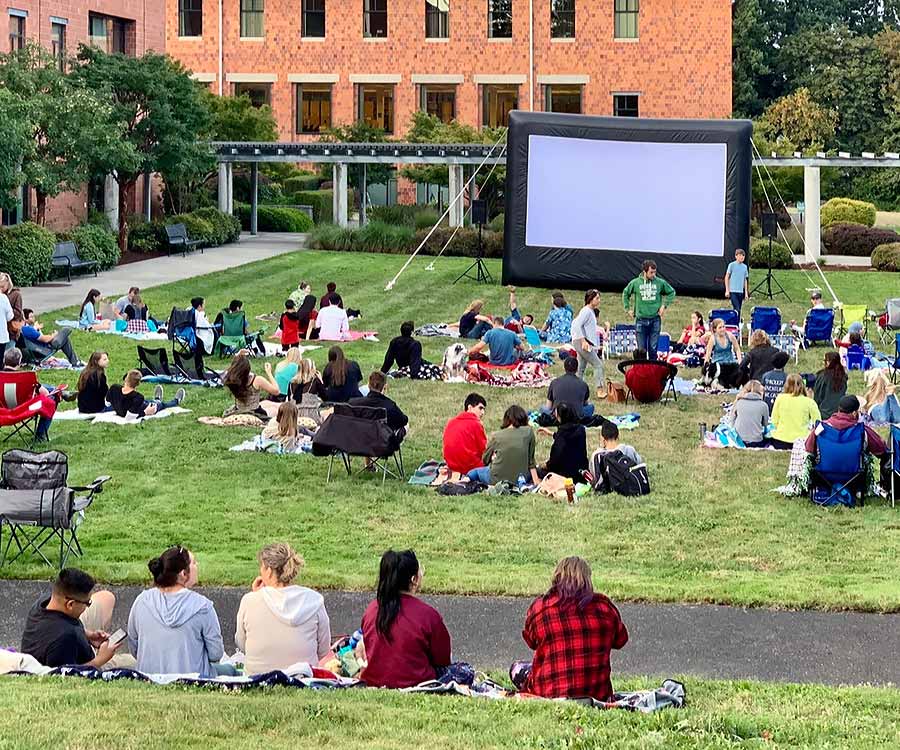 Outdoor Movie Night Gather outside on campus for an evening under the stars in front of the big screen! Bring your own blanket or outdoor seating and enjoy free snacks and fun games until the sun goes down. The feature presentation begins at sunset. This event is held during Week of Welcome.