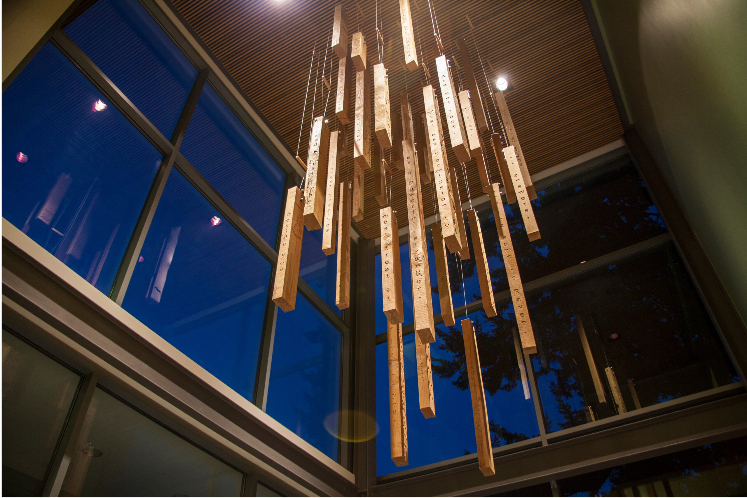 WSU-Vancouver-Impressions-Art-on-Campus | An abstract modern lighting fixture or sculpture hanging from a high ceiling indoors