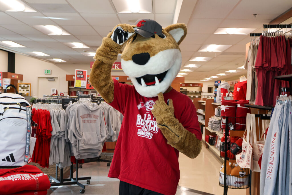 Butch T. Cougar mascot wearing a crimson WSU Vancouver hoodie.