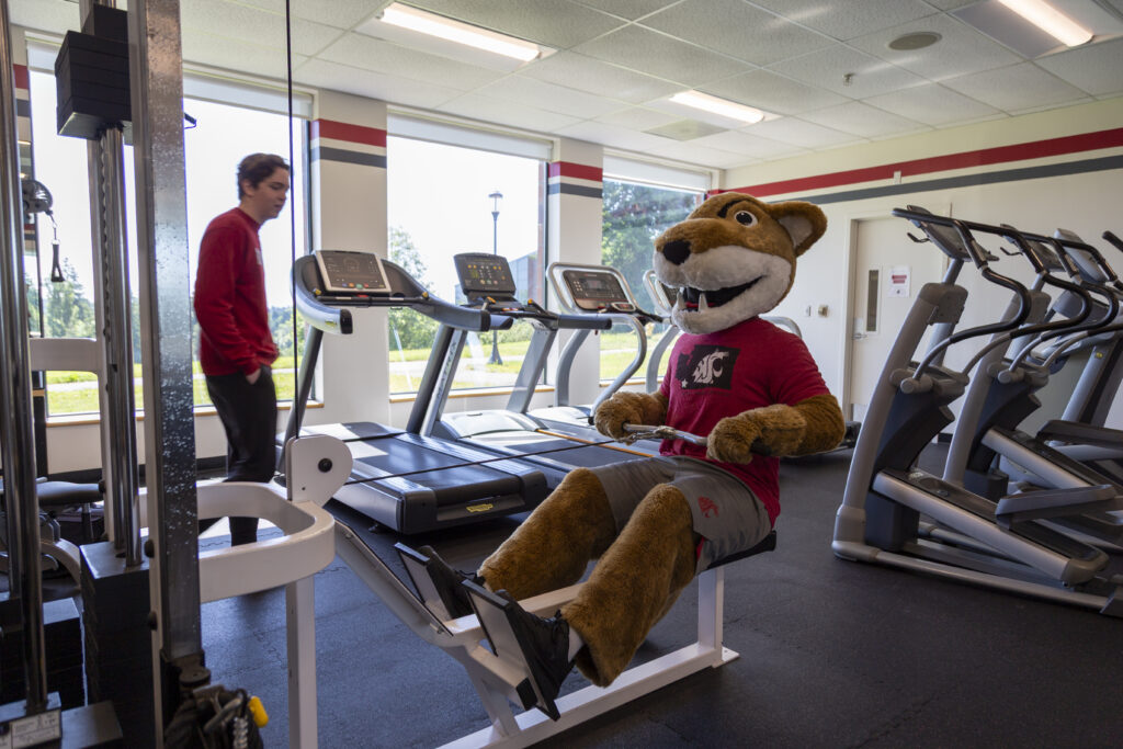 Leg Press: Pushing through the burn. Butch knows that consistency in the gym leads to dominance on the field.