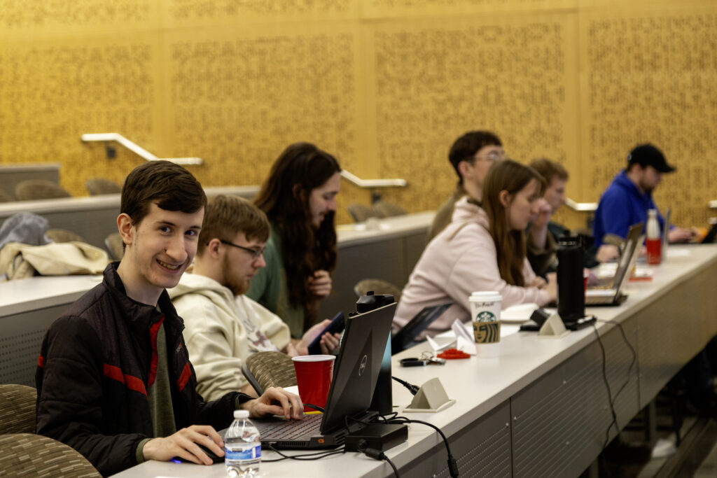 WSU Vancouver students working at individual computer workstations during a class lab session