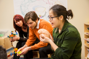 WSU Vancouver Bachelor of Science in Neuroscience A scientist operating complex equipment in a laboratory environment