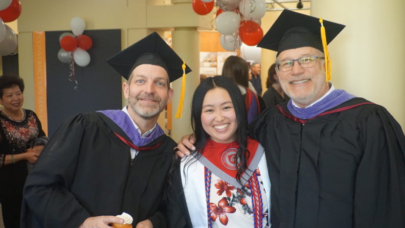 Matt Melcher and Bob Krikac at graduation ceremony with student.