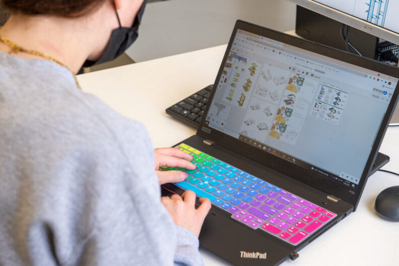 Laptop displaying modeling software.