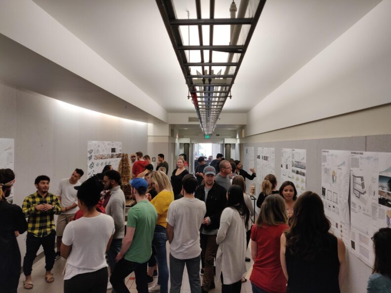Students at poster showcase.