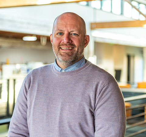 Headshot of Tim Dickerson.